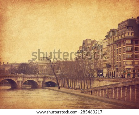 Seine,Paris, France.  Photo in retro style. Added paper texture. Toned image