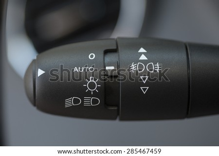 Car interior with light switch