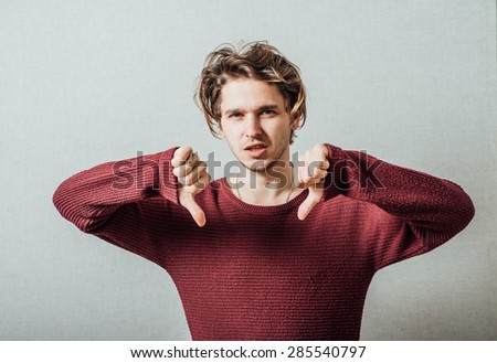 man showing thumbs down