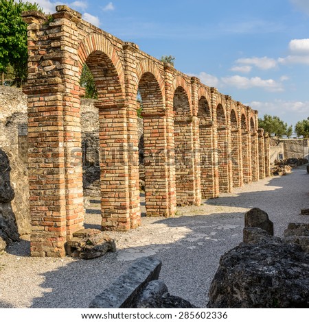 pictured a Caves of Catullo's or Grotte di Catullo a ruins of Roman house 1 century AC.
