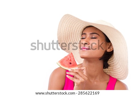 happy, smiling woman holding watermelon