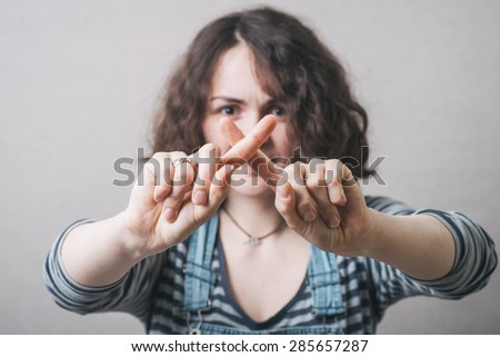 Girl shows a hand stop