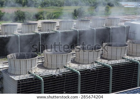 Cooling tower power plant Royalty-Free Stock Photo #285674204