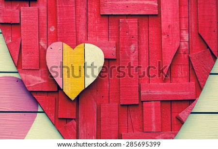 Heart shape on red background made from recycle wood for valentine day