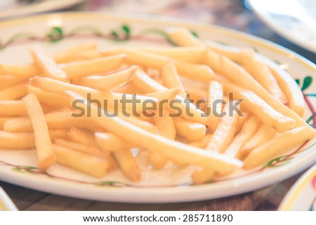 A plate of french fries with catchup - Vintage picture style, Shallow DOF