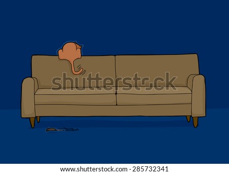 Excited cat on sofa looking for mouse in the dark