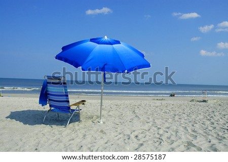 Blue Beach Umbrella and Beach Chair