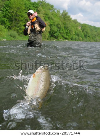 Fly fishing on river Royalty-Free Stock Photo #28591744