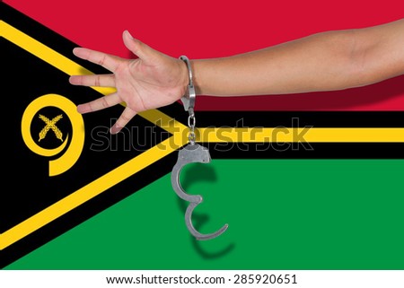 handcuffs with hand on Vanuatu flag