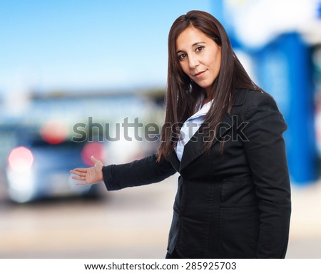 cool business-woman doing welcome sign