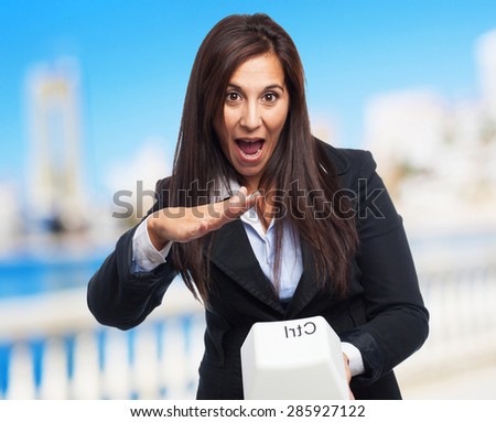 cool business-woman with control key
