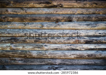 Wooden logs wall of rural house background
