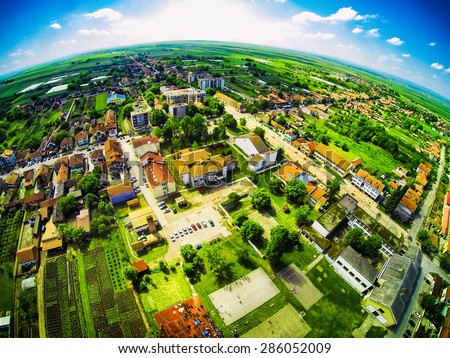 Bird perspective of village. View from the top. Fisheye lens.