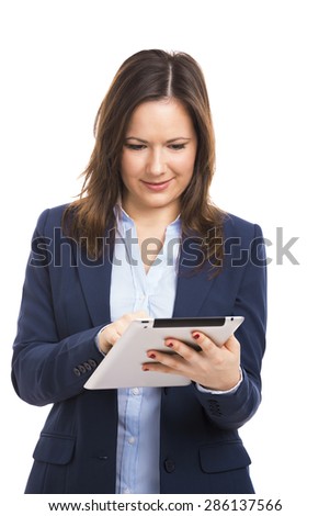 Businesswoman using a tablet in the office 