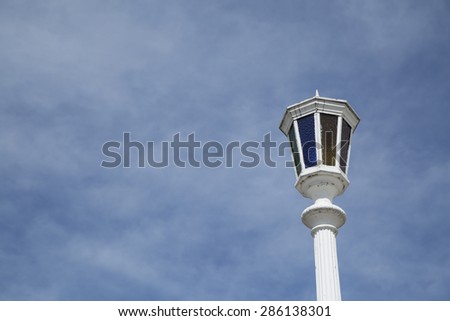 Lantern on sky background with clouds
