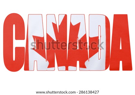Photo of the Canadian maple leaf red and flag within outline cutout of the word, Canada, on white background. 
