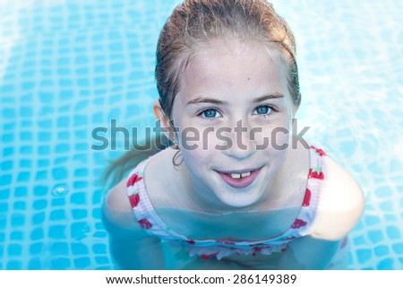 cute little girl in swimming pool
