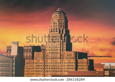 Buffalo City Hall Sunset. Buffalo City Hall and the Buffalo, New York skyline during sunset. Edited with a vintage look. (Public buildings, no release needed.)