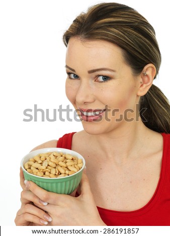 Attractive Happy Young Woman Holding Salted Roasted Peanuts