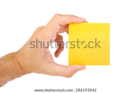 Man hand holding sticky note isolated on white background