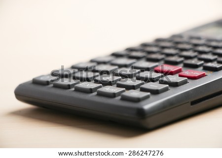 Closeup picture of calculator on the table.