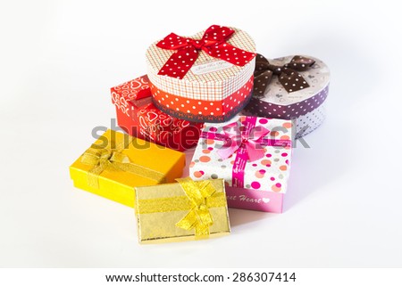 colorful gifts with bows on white