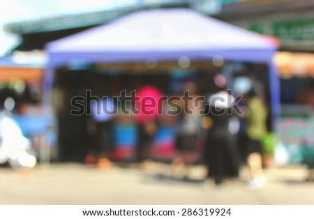 Blurred image of asian collegian line up to buy coffee , vintage color
