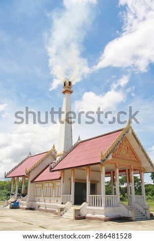 Crematory with cloud and blue sky background in Thailand.