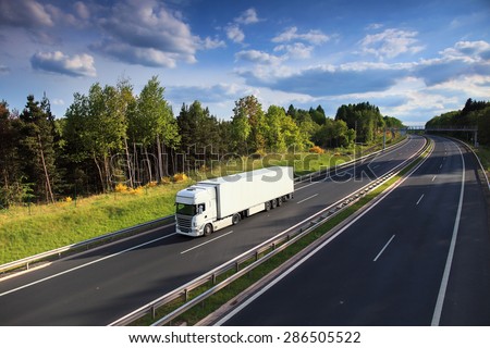 Truck transportation on the road Royalty-Free Stock Photo #286505522