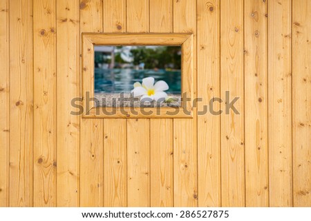 photo frame on wooden board background texture
