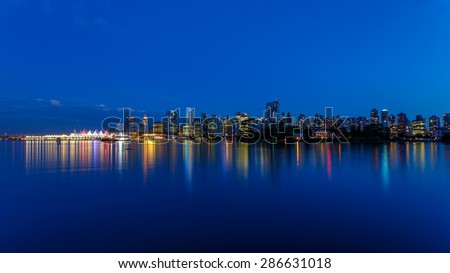 Vancouver skyline at Dusk as seen from Stanley Park, British Columbia, Canada