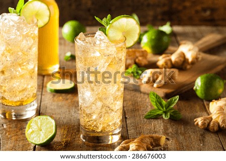 Refreshing Golden Ginger Beer with Lime and Mint Royalty-Free Stock Photo #286676003