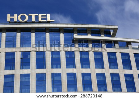 View of the modern hotel on the sky background
