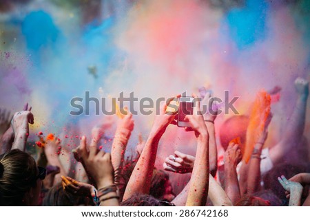 Celebrants dancing during the color Holi Festival Royalty-Free Stock Photo #286742168