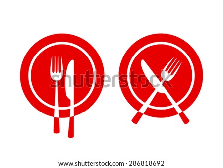 Cutlery on red plate