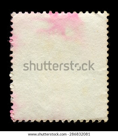 The reverse side of a postage stamp.