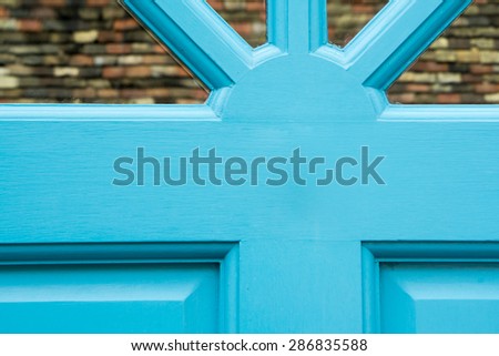 Blue door closeup conceptual image
