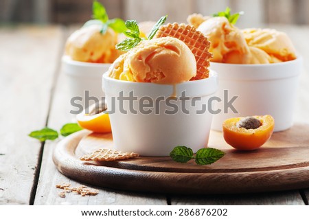 Apricot ice-cream with mint, selective focus Royalty-Free Stock Photo #286876202