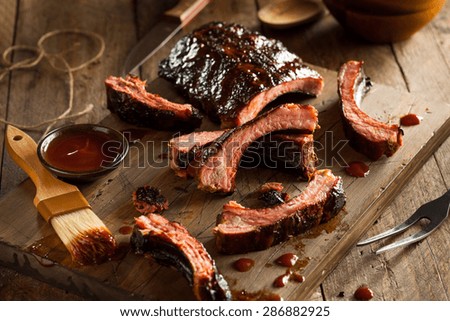 Homemade Smoked Barbecue Pork Ribs Ready to Eat Royalty-Free Stock Photo #286882925
