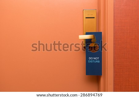 Do not disturb sign on hotel door