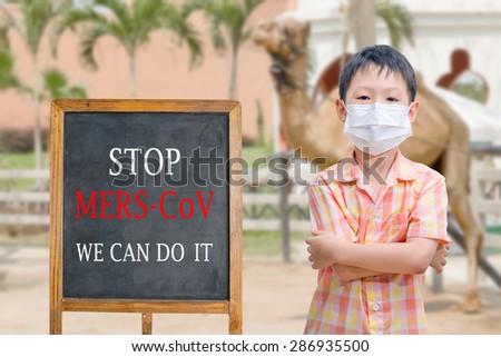  Asian boy wearing mask with text "Stop MERS-CoV We can do it" Royalty-Free Stock Photo #286935500