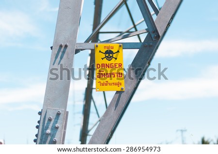 Warning label on High voltage poles