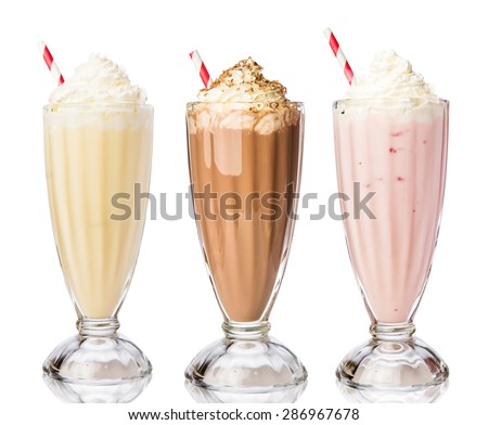 Three glasses of various milkshakes (chocolate, strawberry and vanilla) isolated on white background Royalty-Free Stock Photo #286967678