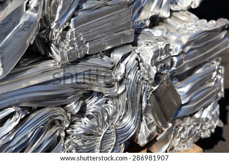 Scrap aluminium pressed together for melting and recycling.  Royalty-Free Stock Photo #286981907