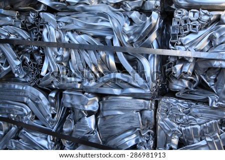 Scrap aluminium pressed together for melting and recycling.  Royalty-Free Stock Photo #286981913