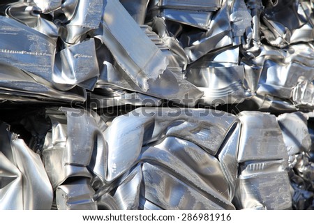Scrap aluminium pressed together for melting and recycling.  Royalty-Free Stock Photo #286981916