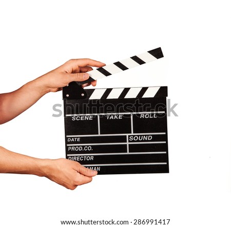 Man hands holding film clapper isolated on white background