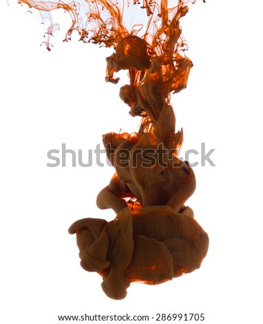 Studio shot of brown ink in water, isolated on white background