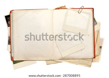 Old book and photos. Objects isolated on white background Royalty-Free Stock Photo #287008895