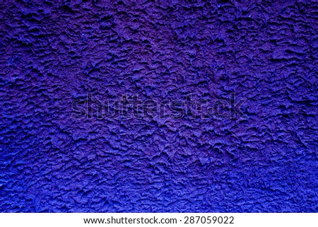 Concrete wall background close up,Blue and purple